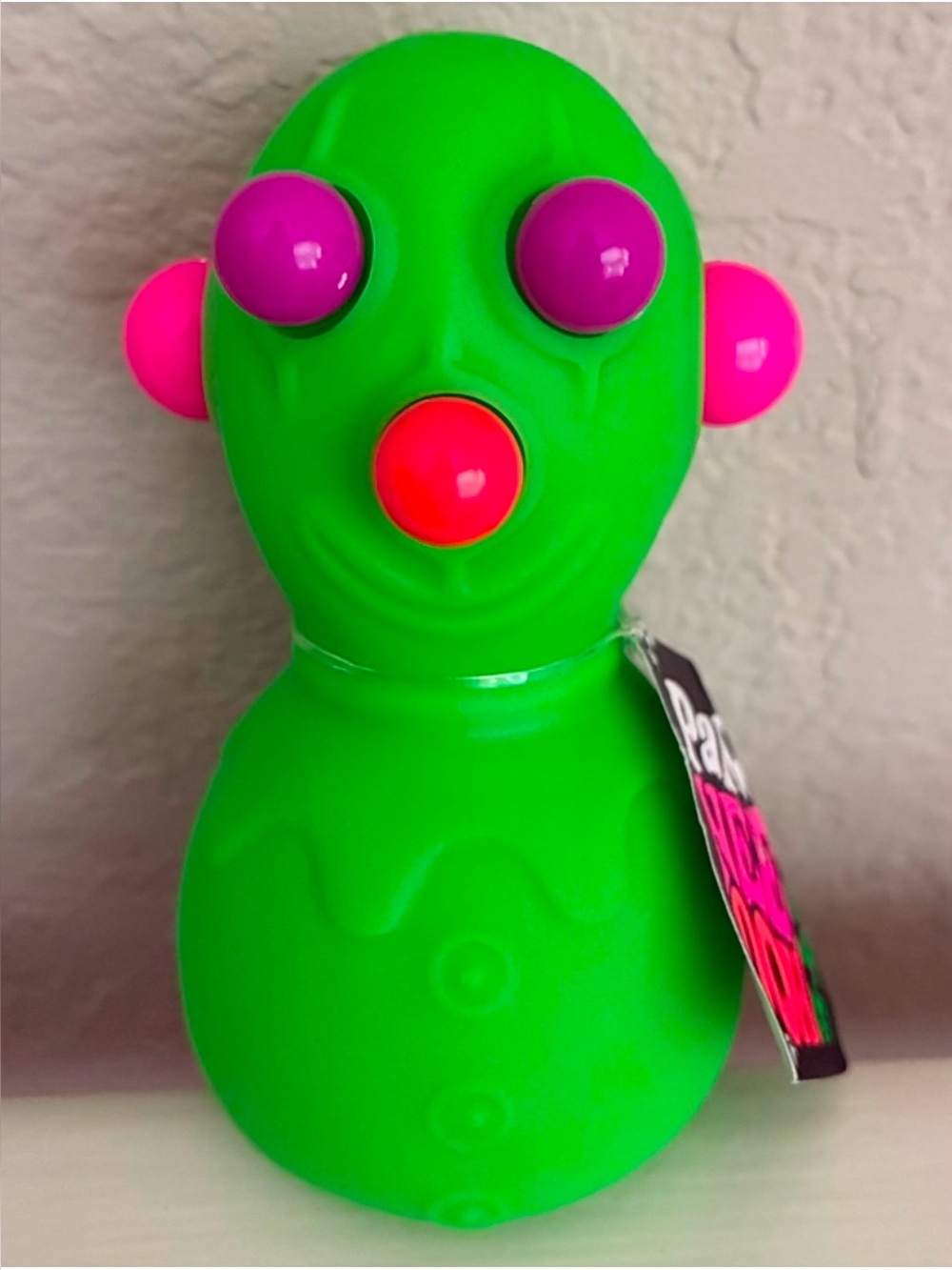 Brand new NeeDoh “Panic Pete” Green Clown Squishie Toy. NWT. Rare & Hard to find